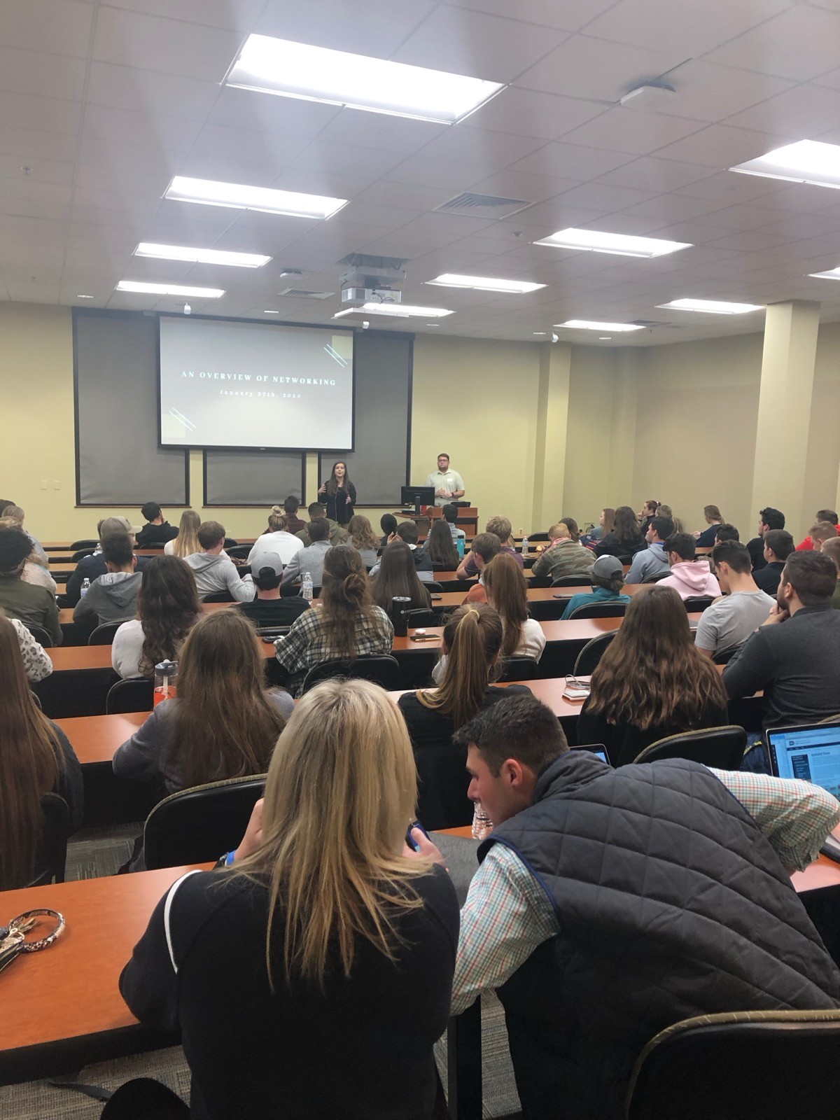 A packed lecture hall of student athletes attending the Life After Sports program Ceci created